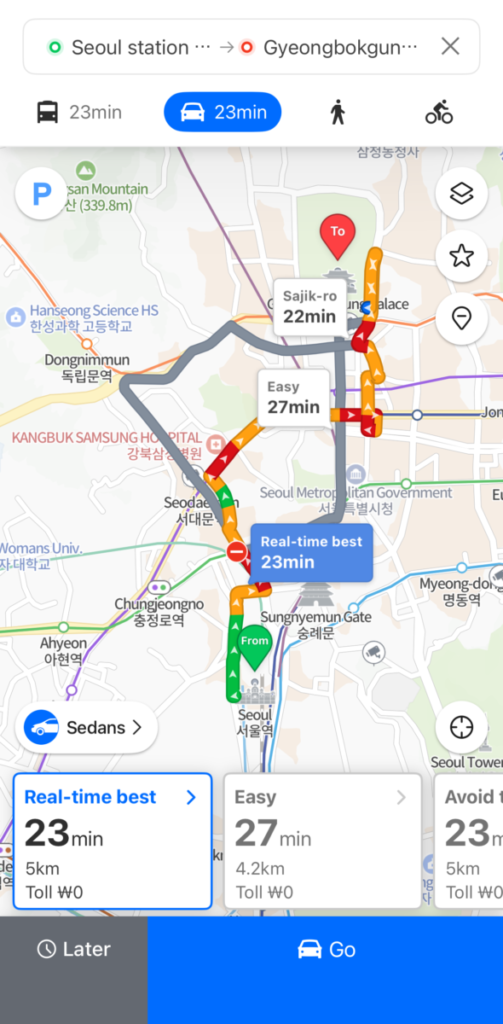 Navigation screen for driving showing estimated time (23 min) and zero tolls for the trip to Gyeongbokgung.